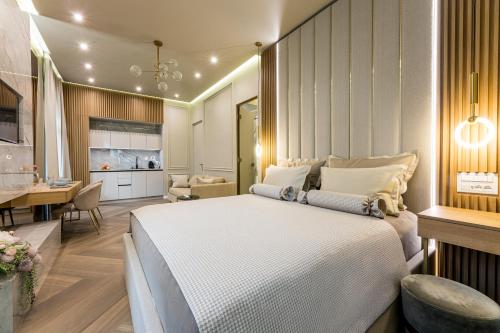 Ένα ή περισσότερα κρεβάτια σε δωμάτιο στο K&K2 Luxury Studios