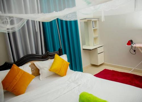 Postel nebo postele na pokoji v ubytování 7HillsGidRine Apartment