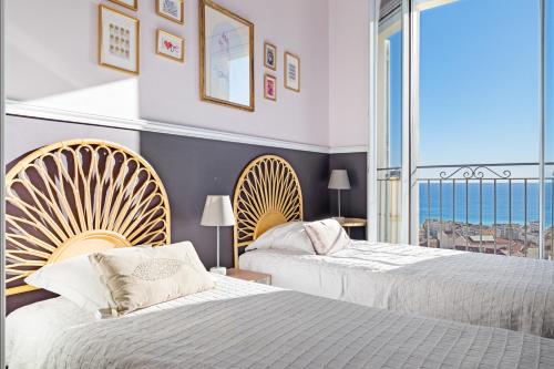 Ένα ή περισσότερα κρεβάτια σε δωμάτιο στο Magnifique Villa d'époque vue mer, plage à 12 min à pieds