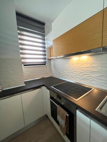 Kuchyň nebo kuchyňský kout v ubytování B2 Apartment 3