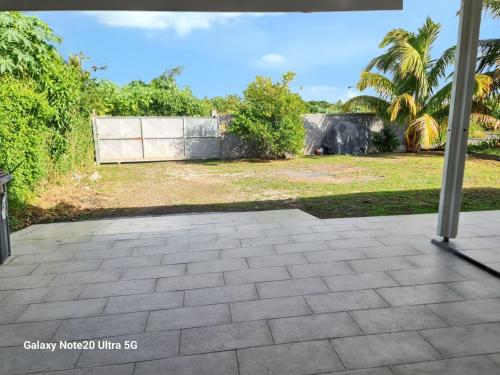 a view from the patio of a house at Maison charmante à Anse-Bertrand avec jardin in Anse-Bertrand
