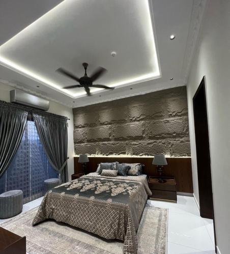Giường trong phòng chung tại Villa alex33