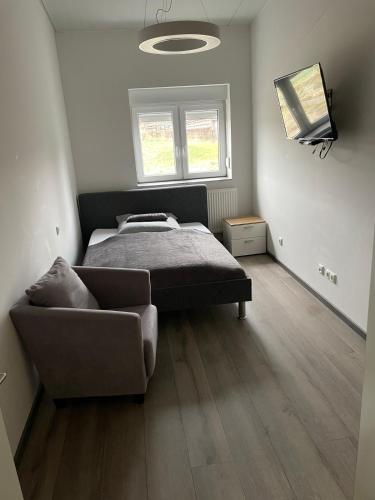 Postel nebo postele na pokoji v ubytování Ruhige Wohnung mit S-Bahn Bindung