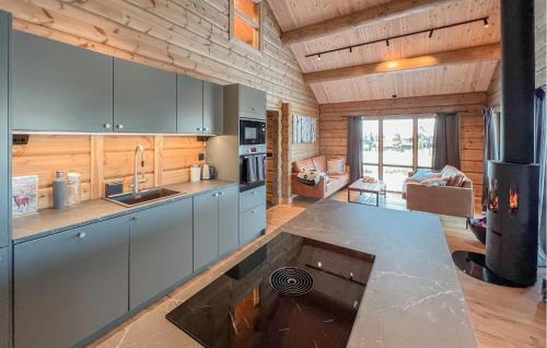 a kitchen with a counter top in a room at Amazing Home In Øyer With Wifi in Øyer