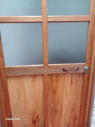 a close up of a wooden door at Hotel Deltoro in San Augustín
