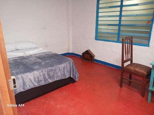 Postel nebo postele na pokoji v ubytování Hotel Deltoro