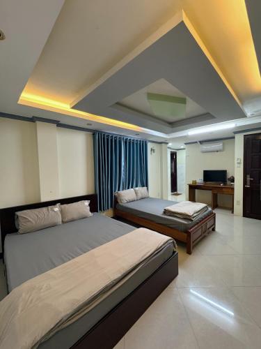 Katil atau katil-katil dalam bilik di Homestay Bờ Hồ Cần Thơ