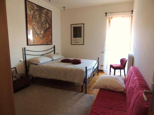 Posteľ alebo postele v izbe v ubytovaní La Collina D'Oro