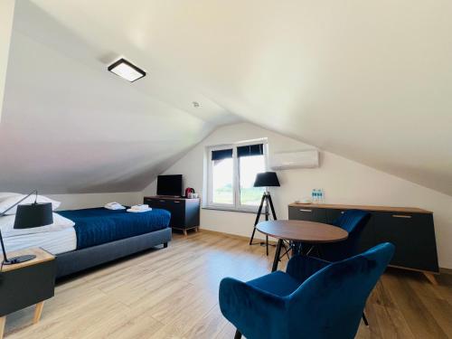 Posezení v ubytování ROYAL Villa - ADULTS ONLY - Apartamenty z widokiem na Zalew Wiślany - Jacuzzi w cenie - Masaże relaksacyjne - Grupa Hotelowa PlażoweLove