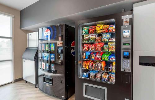 a refrigerator filled with lots of food and drinks at Extended Stay America Premier Suites - Pensacola - NAS Corry Station in Pensacola