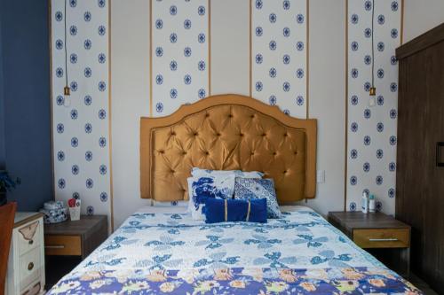 Ένα ή περισσότερα κρεβάτια σε δωμάτιο στο Ronda Hotel Boutique by Chat Noir