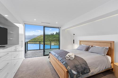 Ένα ή περισσότερα κρεβάτια σε δωμάτιο στο Hidden Paradise in Christchurch