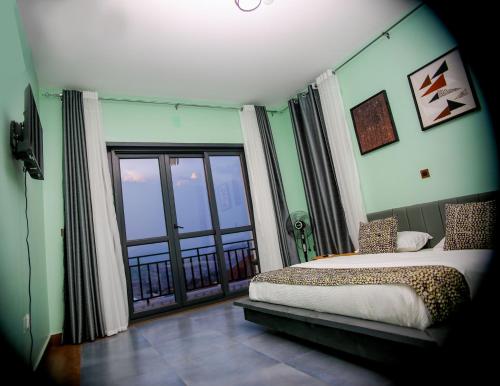 Ένα ή περισσότερα κρεβάτια σε δωμάτιο στο Faraja Guest House
