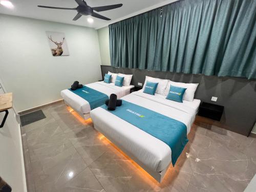 Ένα ή περισσότερα κρεβάτια σε δωμάτιο στο BEATRIX HOTEL