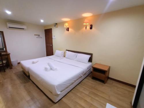 Postel nebo postele na pokoji v ubytování D'Feringghi Hotel