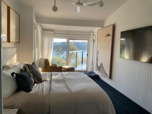 Ένα ή περισσότερα κρεβάτια σε δωμάτιο στο Heavenly Avalon Sunseeker