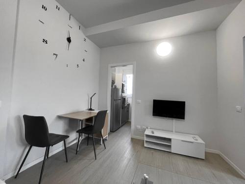 TV a/nebo společenská místnost v ubytování Gaelle Voghera apartment