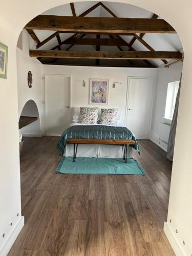 Ένα ή περισσότερα κρεβάτια σε δωμάτιο στο Loft in Bungay