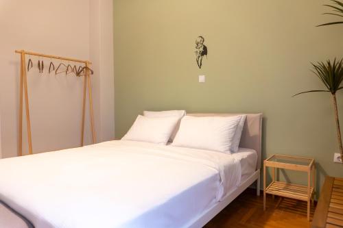 Voodi või voodid majutusasutuse 50 Steps Metro Kato Patisia Renovated Athens Apt toas