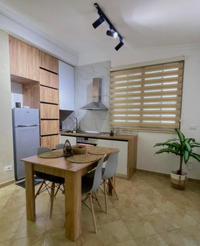 Køkken eller tekøkken på Mai Apartment