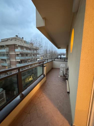 a balcony of a building with a view of a city at Residence le Spiagge in Rimini