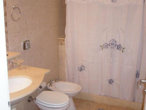Ванная комната в Hotel Queguay
