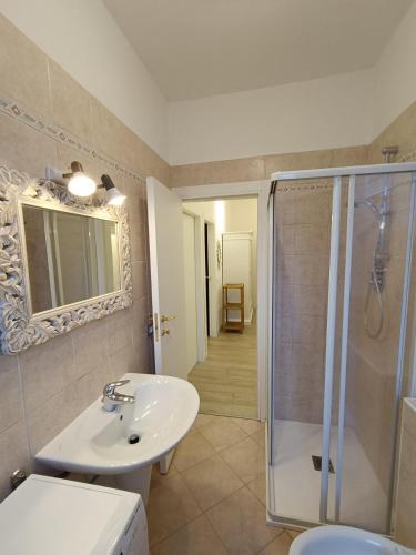 a bathroom with a sink toilet and a shower at Casa vacanze Orobie in Villa di Tirano