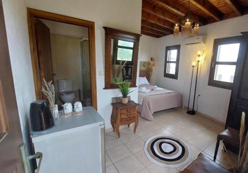 a room with a bedroom with a bed in it at Saint Michel Hotel in Rhodes Town