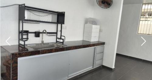 Η κουζίνα ή μικρή κουζίνα στο Sekinchan SeaView Garden 20pax 6R6B HighView