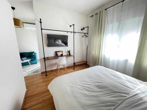 Letto o letti in una camera di 19 Living