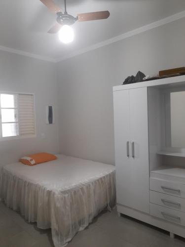 Una cama o camas en una habitación de BG área de lazer