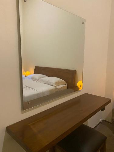 Postel nebo postele na pokoji v ubytování Gecho Inn Budget