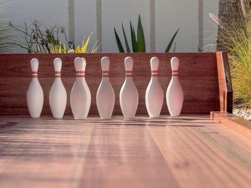 a row of bowling pins lined up in a row at Villa 72 RAK in Ras al Khaimah