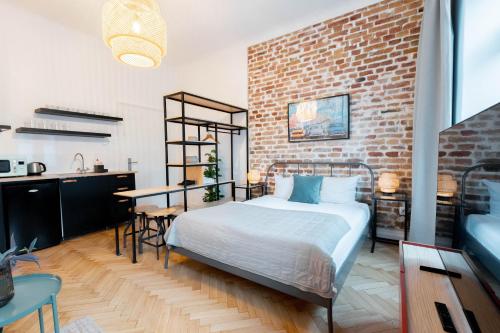Postel nebo postele na pokoji v ubytování Boutique Apartments Possonium