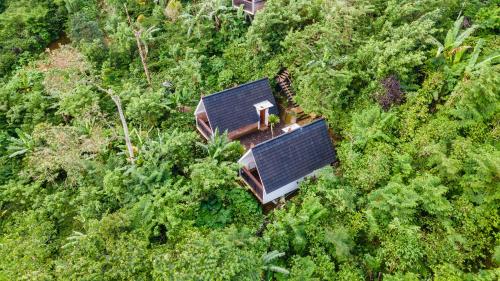 an overhead view of a house with a solar panel at green slope villa glamping in Gitgit