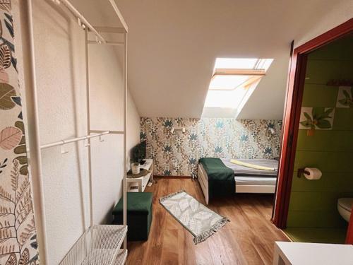 Una cama o camas en una habitación de Hotel WIR