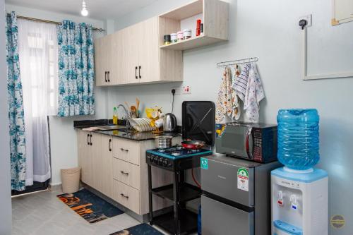 Kuchyň nebo kuchyňský kout v ubytování Tugo Homes, Waiyaki Way