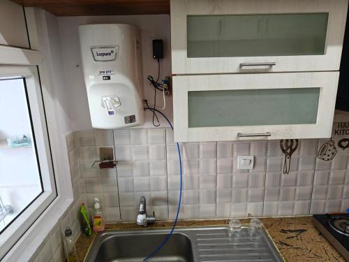 Kuchyň nebo kuchyňský kout v ubytování Nest