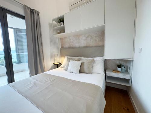 Ένα ή περισσότερα κρεβάτια σε δωμάτιο στο VILLA ONEUM - Apartment SOL with privat POOL