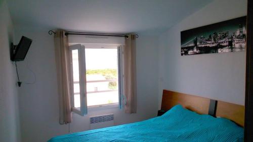 Posteľ alebo postele v izbe v ubytovaní VILLA T3 bord de mer - vue mer à 500 m de la plage- piscine chauffée A CASETTA DI A SPIAGGIA