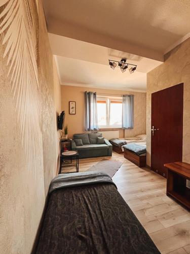 Una cama o camas en una habitación de Hotel WIR