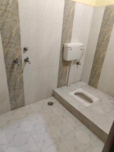 Koupelna v ubytování Kailashi bhawan