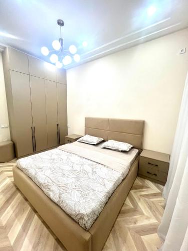 Postel nebo postele na pokoji v ubytování - Cozy Apartment in Cozy Location -