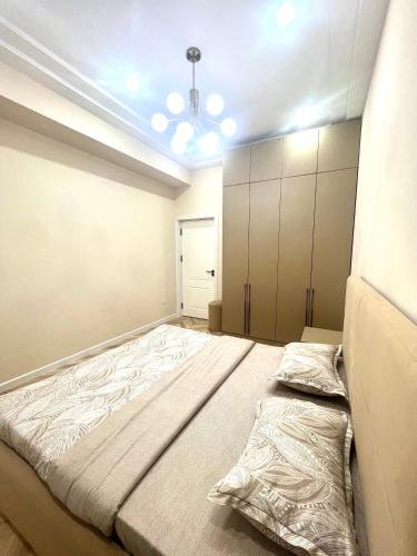 Postel nebo postele na pokoji v ubytování - Cozy Apartment in Cozy Location -