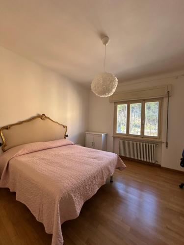 Ένα ή περισσότερα κρεβάτια σε δωμάτιο στο Casa Jolie