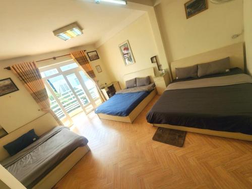 Postel nebo postele na pokoji v ubytování Đà Lạt Chay Guest House