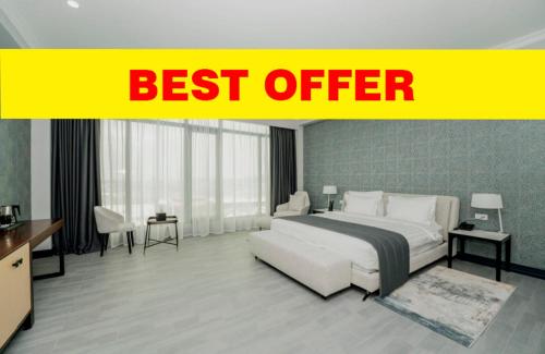 a bedroom with a bed in the middle of it at Hills Resort Hotel in Yerevan