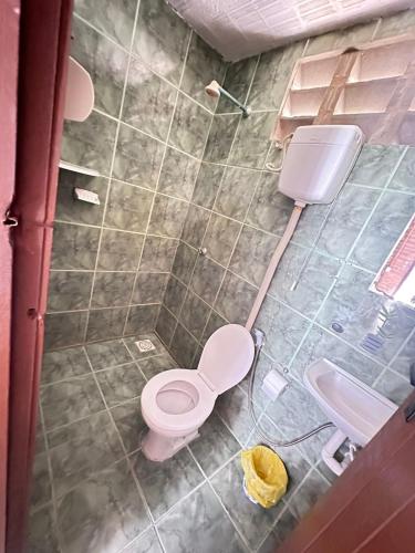 Ein Badezimmer in der Unterkunft Pousada Sol Nascente