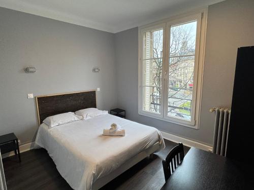 Postel nebo postele na pokoji v ubytování Abc Hotel