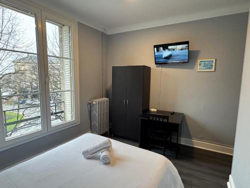 TV a/nebo společenská místnost v ubytování Abc Hotel